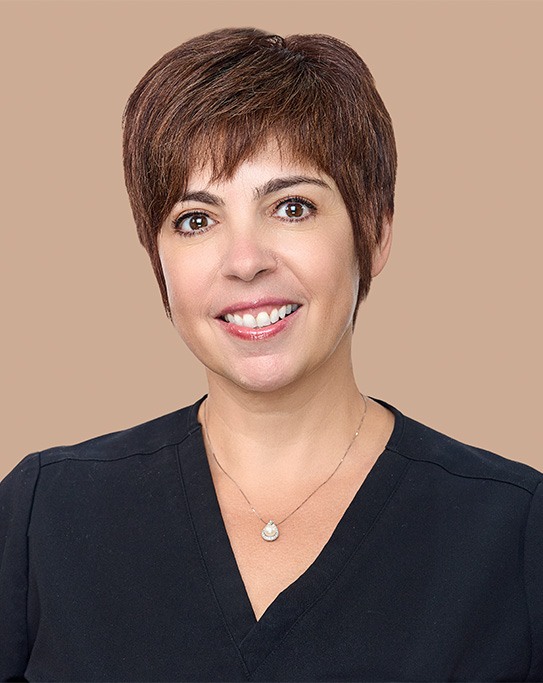 Smiling woman in dental chair