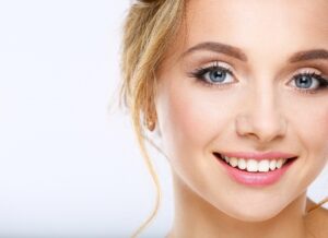 Close up of young woman with an attractive smile