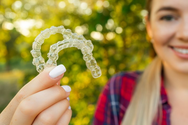 Lady shows off Invisalign clear aligner